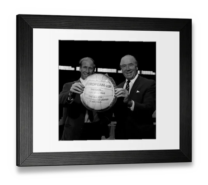 Framed Print : Manchester United star Bobby Charlton with his manager Sir Matt Busby receiving an award Framed Print : Manchester United star Bobby Charlton with his manager Sir Matt Busby receiving an award