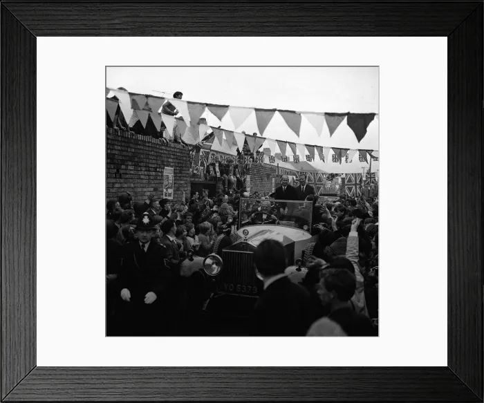Framed Print : Football brothers Jack and Bobby Charlton are mobbed by crowds after leaving their