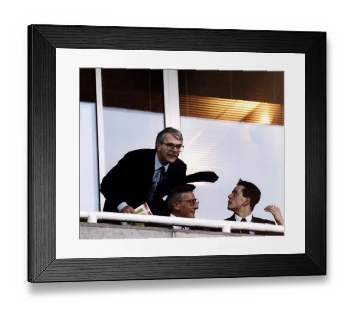 Framed Print : John Major British Prime Minister talks to his son James during the Arsenal-Aston Villa Framed Print : John Major British Prime Minister talks to his son James during the Arsenal-Aston Villa