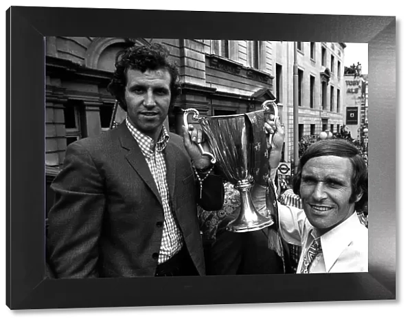 Peter Osgood and John Dempsie of Chelsea on open top bus with European cup winners cup