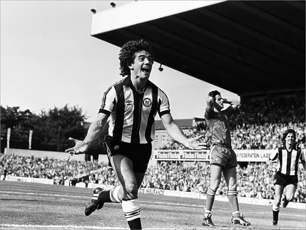 Newcastle Uniteds Kevin Keegan celebrates after scoring a goal on his debut at St
