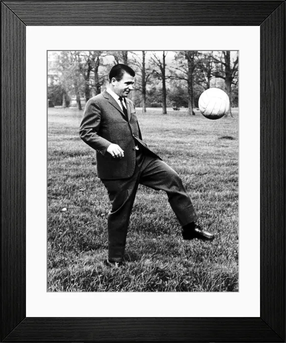 Framed Print : Hungarian footballer Ferenc Puskas of Real Madrid practicing his ball control skills in a Framed Print : Hungarian footballer Ferenc Puskas of Real Madrid practicing his ball control skills in a
