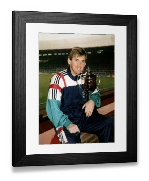 Framed Print : Kenny Dalglish former Footballer and Football Manager holding Man of the Decade trophy Framed Print : Kenny Dalglish former Footballer and Football Manager holding Man of the Decade trophy