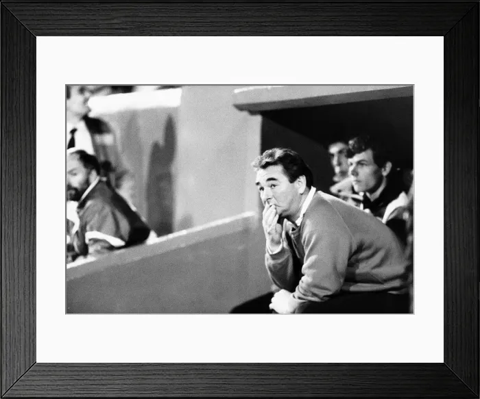 Framed Print : Brian Clough Football manager of Nottingham Forest FC sitting on team bench during match Framed Print : Brian Clough Football manager of Nottingham Forest FC sitting on team bench during match