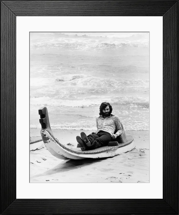 Framed Print : George Best alone on a deserted Spanish beach Circa 1974 Framed Print : George Best alone on a deserted Spanish beach Circa 1974