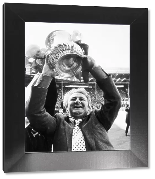 Tommy Docherty manager of Manchester United May 1977 holds up the FA Cup after