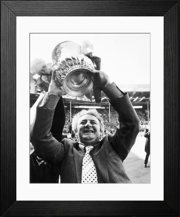 Framed Print : Tommy Docherty manager of Manchester United May 1977 holds up the FA Cup after Framed Print : Tommy Docherty manager of Manchester United May 1977 holds up the FA Cup after