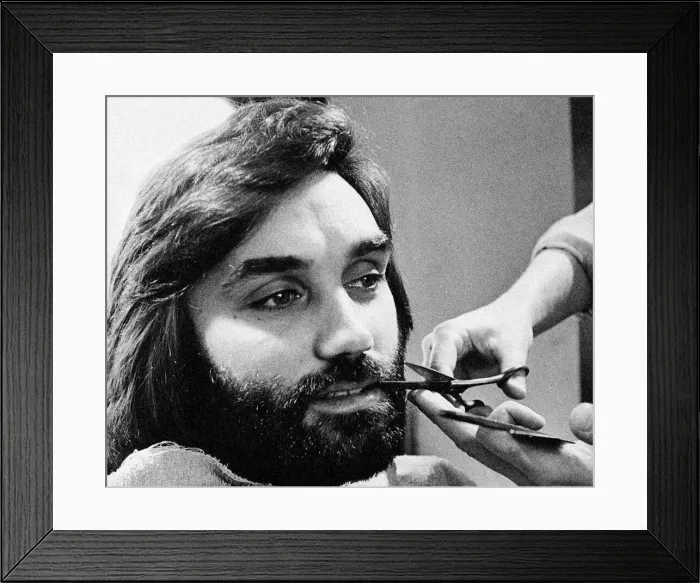 Framed Print : George Bests seen here having his beard trimmed at the barbers May 1974 Framed Print : George Bests seen here having his beard trimmed at the barbers May 1974