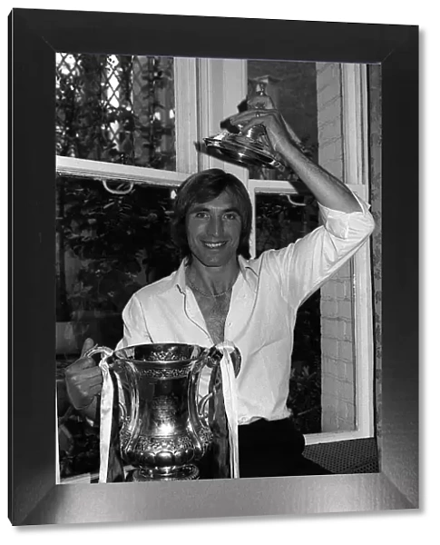 West Ham captain Billy Bonds poses with the FA Cup at the reception at the Town hall