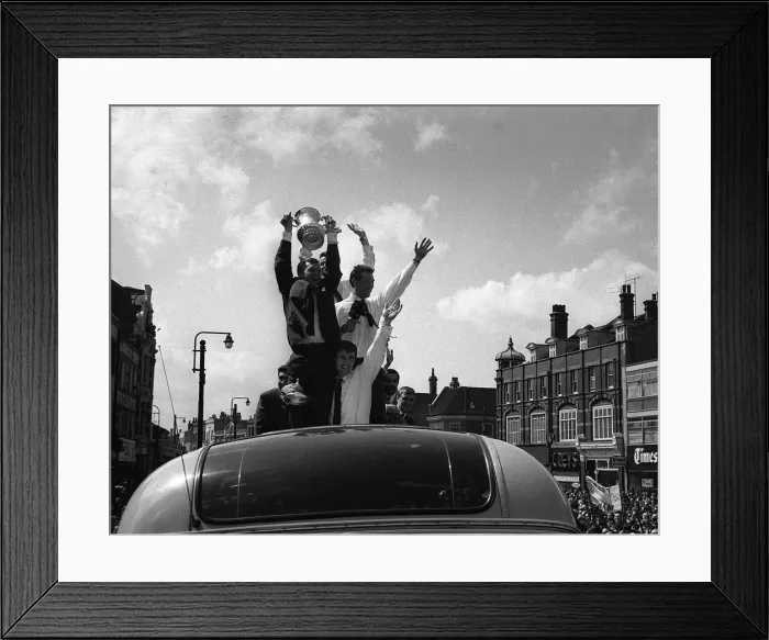 Framed Print : Bobby Moore holds up the FA Cup during the parade around East London after the Hammers Framed Print : Bobby Moore holds up the FA Cup during the parade around East London after the Hammers