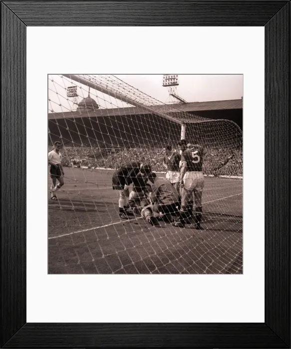 Framed Print : The injured Manchester United goalkeeper, Gregg, receiving attention after Framed Print : The injured Manchester United goalkeeper, Gregg, receiving attention after