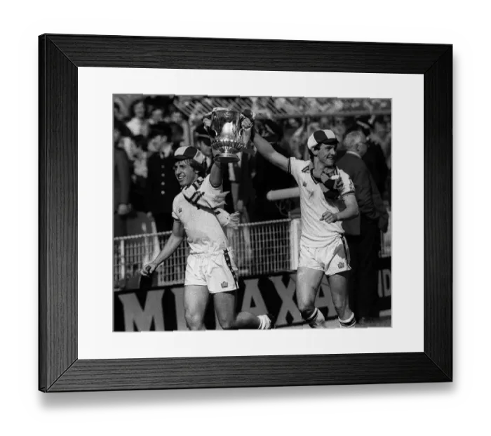 Framed Print : Young seventeen years old Paul Allen (right) leads the way with the FA Cup after West Ham