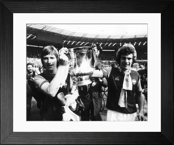 Framed Print : Trevor Brooking right and Kevin Locke hold the FA Cup Mafter beating Fulham in the FA Framed Print : Trevor Brooking right and Kevin Locke hold the FA Cup Mafter beating Fulham in the FA