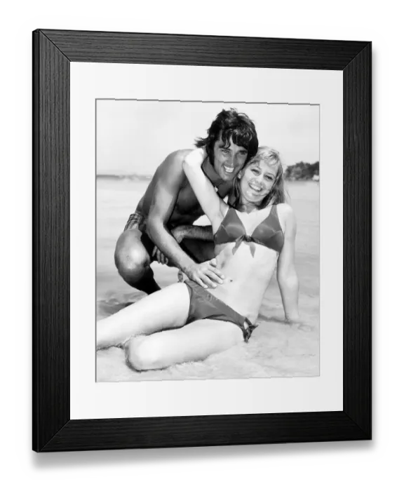 Framed Print : George Best and Susan George on the Beach in Majorca