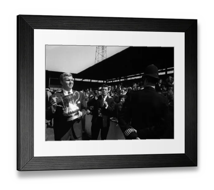 Framed Print : FA Cup 1964 Bobby Moore with the FA Cup walking around the Upton Park ground showing Framed Print : FA Cup 1964 Bobby Moore with the FA Cup walking around the Upton Park ground showing