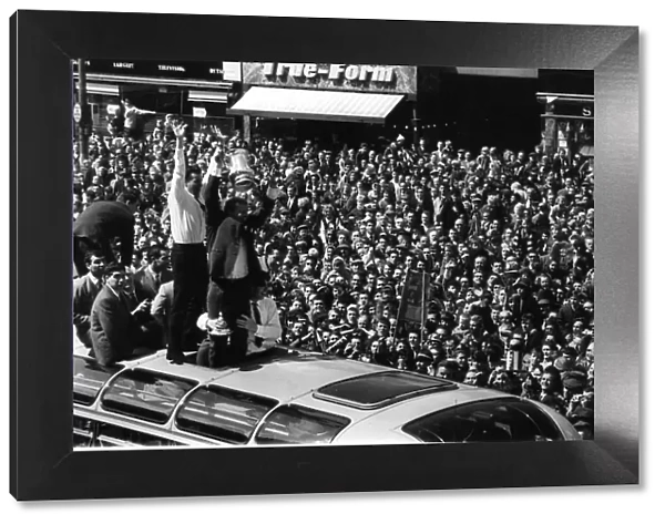 West Ham United celebrate winning the FA Cup at Wembley in 1964 showing off the trophy