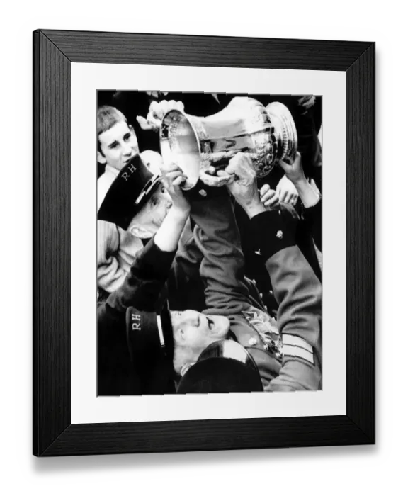 Framed Print : Chelsea Pensioners get a hand on the FA Cup as Dave Webb hands it to them during Framed Print : Chelsea Pensioners get a hand on the FA Cup as Dave Webb hands it to them during