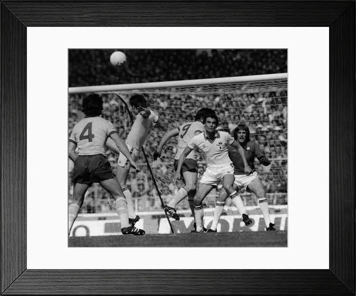 Framed Print : Brooking in defence as Arsenal launch an attack during the West Ham v Arsenal Cup Final Framed Print : Brooking in defence as Arsenal launch an attack during the West Ham v Arsenal Cup Final