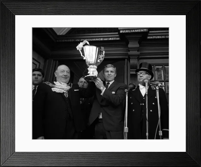 Framed Print : West Ham Captian Bobby Moore shows the European Cup Winners Cup trophy to the crowds