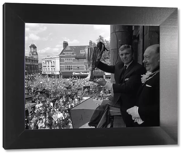 West Ham Captain Bobby Moore shows the European Cup Winners Cup trophy to the crowds