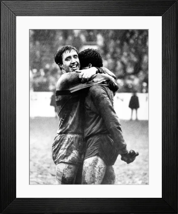 Framed Print : John Bond hugs goalkeeper Jim Standen after West Ham had beaten Manchester United in