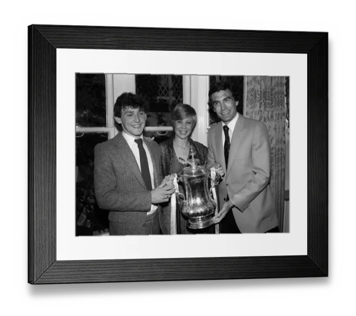 Framed Print : Seventeen years old Paul Allen poses with the FA Cup with Trevor Brooking