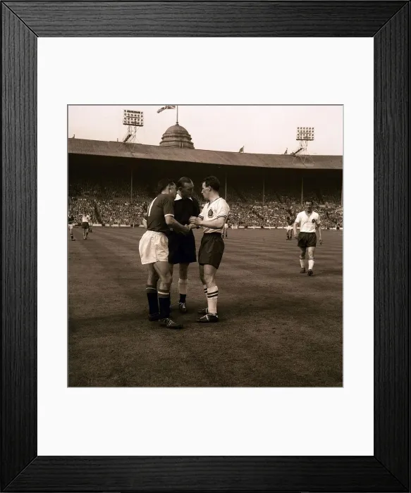 Framed Print : two football players from bolton wanderers and manchester united shake hands during Framed Print : two football players from bolton wanderers and manchester united shake hands during