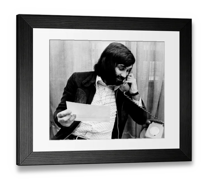 Framed Print : George Best ex Manchester United footballer on phone 1980 Framed Print : George Best ex Manchester United footballer on phone 1980