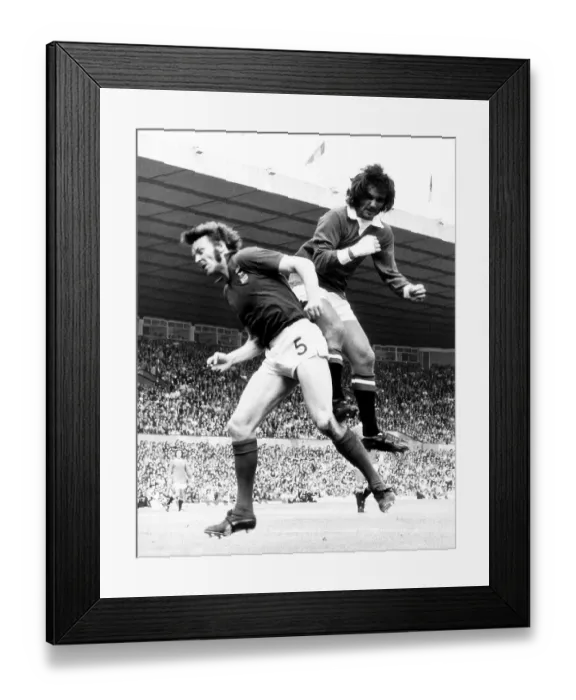 Framed Print : George Best of Manchester United jumps for the ball Aug 1972 against Alan Hunter of Framed Print : George Best of Manchester United jumps for the ball Aug 1972 against Alan Hunter of