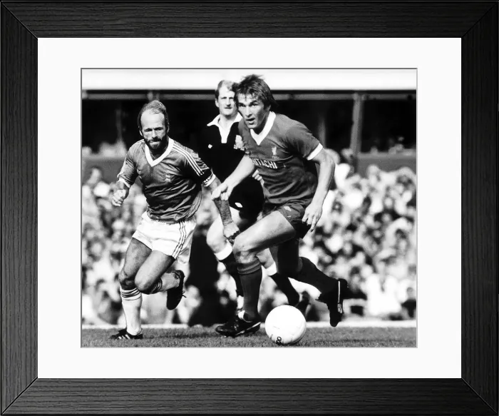 Framed Print : Liverpools Kenny Dalglish shadowed by fellow Scot Archie Gemmill during their