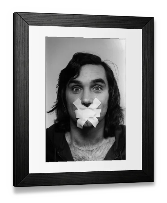 Framed Print : George Best Football player of Manchester United, Mar 1976 with his mouth taped up Framed Print : George Best Football player of Manchester United, Mar 1976 with his mouth taped up