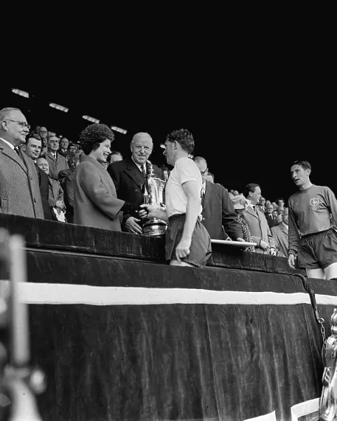 Danny Blanchflower receives the FA Cup May 1962 from Queen Elizabeth watched by