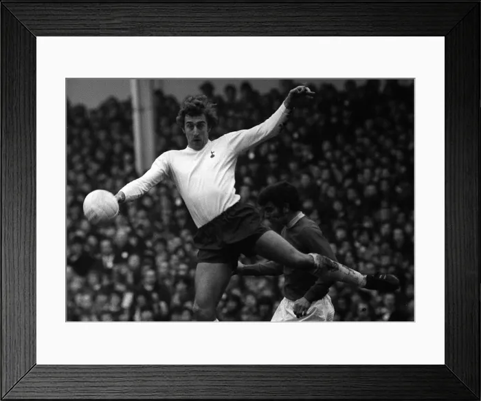 Framed Print : Tottenham Hotspurs Martin Chivers outjumps Evertons Henry Newton during their league Framed Print : Tottenham Hotspurs Martin Chivers outjumps Evertons Henry Newton during their league