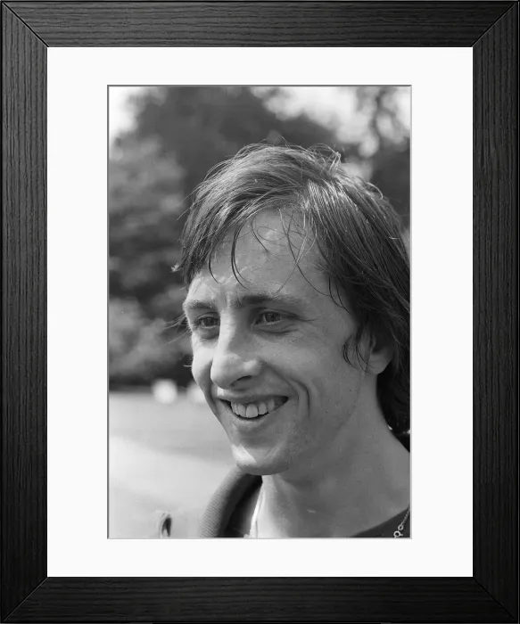 Framed Print : Ajax Amsterdam and Holland footballer Johan Cruyff takes a break from training as Ajax