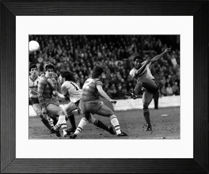 Framed Print : John Barnes of Watford bends the ball around the Chelsea defence for a shot at goal
