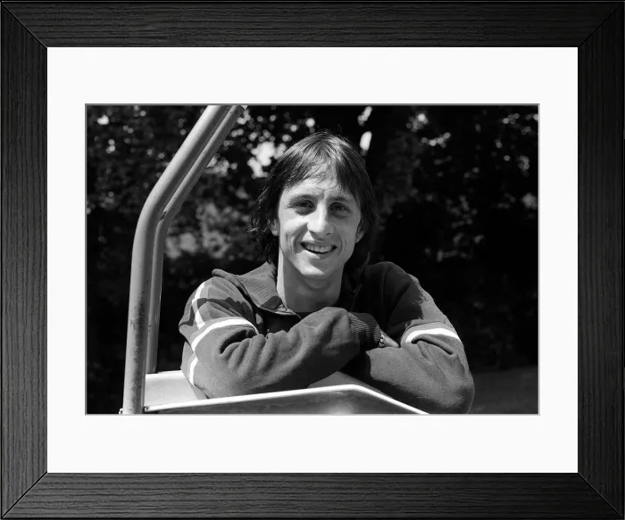 Framed Print : Ajax Amsterdam and Holland footballer Johan Cruyff takes a break from training as Ajax