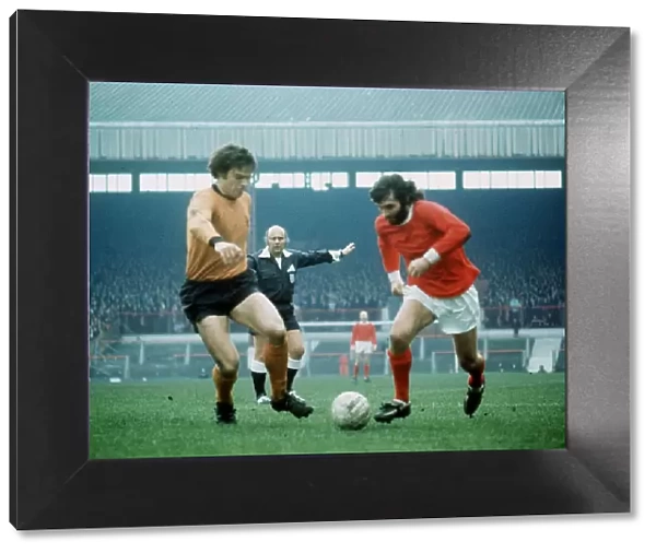 Manchester Uniteds George Best (right) 1971 and Wolves F Munroe challenging for the ball