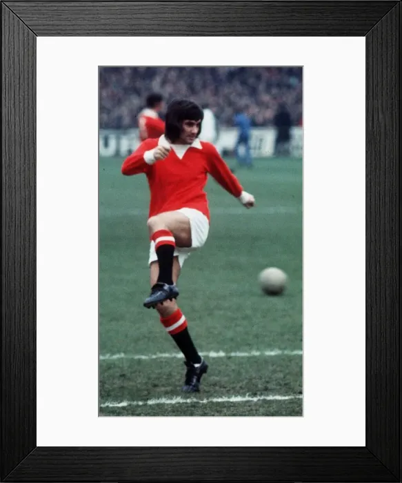 Framed Print : Manchester Uniteds George Best seen here controlling the ball against Leeds Framed Print : Manchester Uniteds George Best seen here controlling the ball against Leeds