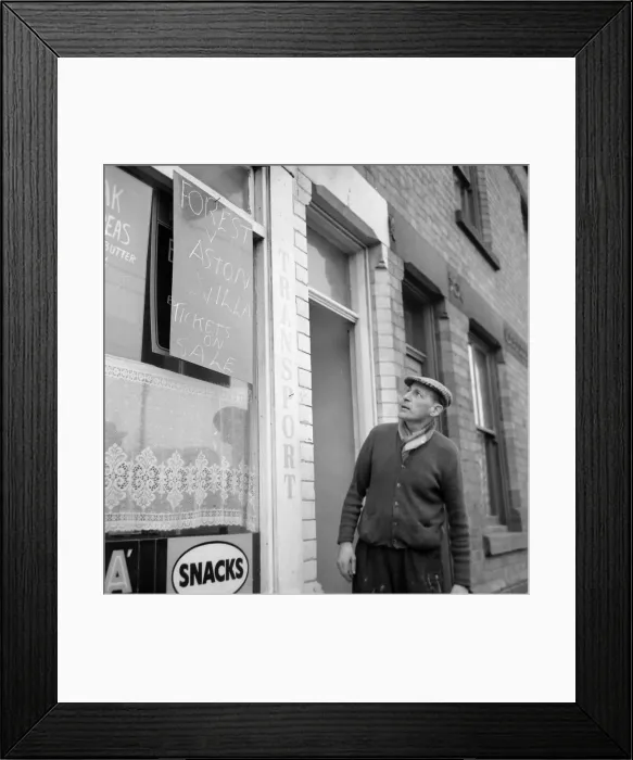 Framed Print : Notts Forest fan and cafe owner with his unwanted FA cup semi final tickets for sale