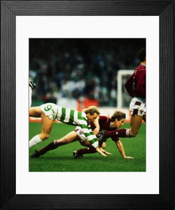 Framed Print : Celtic versus Hearts Premier League football Frank McAvennie tumbles after Framed Print : Celtic versus Hearts Premier League football Frank McAvennie tumbles after