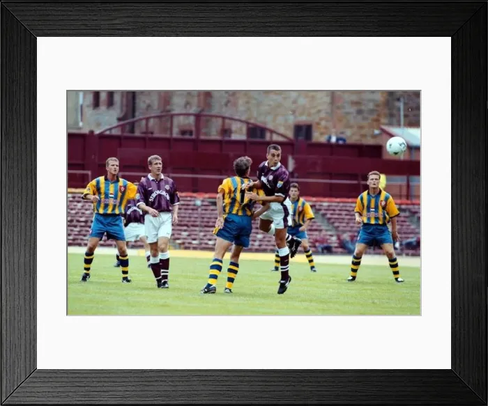 : Paul Ritchie Hearts football player heads clear during friendly with Southampton : Paul Ritchie Hearts football player heads clear during friendly with Southampton