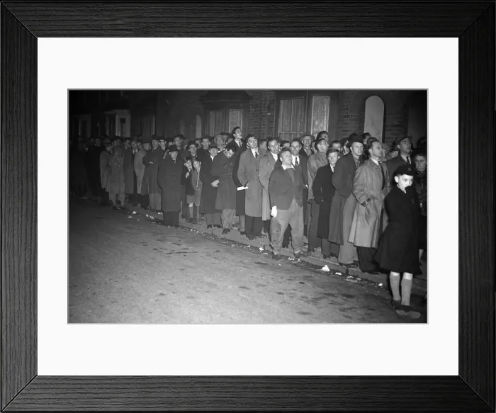Framed Print : Brentford supporters queue up for cup tie tickets against Chelsea