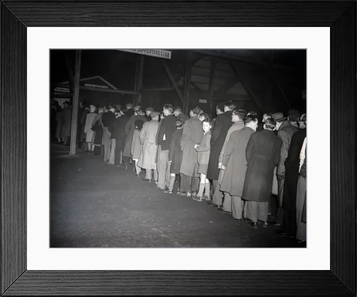 Framed Print : Brentford supporters queue up for cup tie tickets against Chelsea