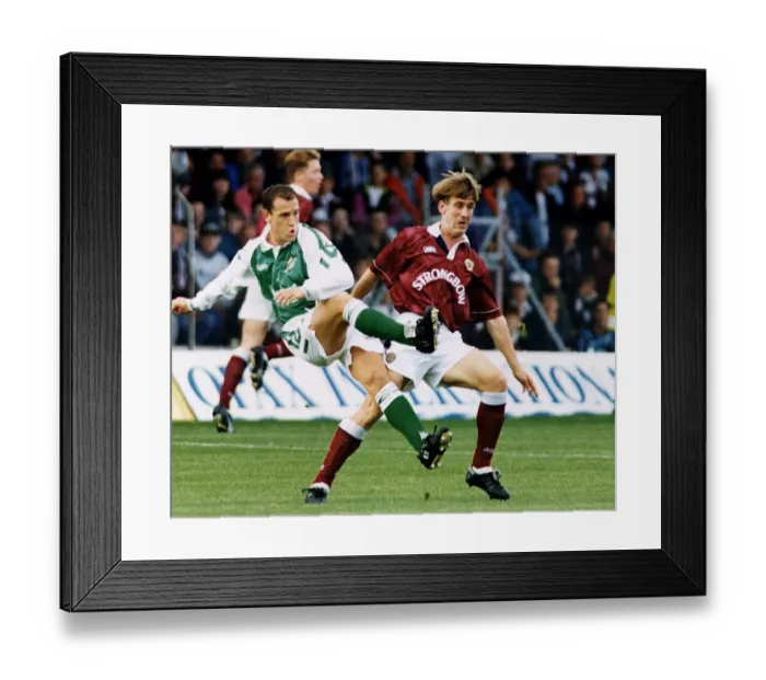 Framed Print : David Farrel beats Gary Mackay in a midfield tussle Hearts versus Hibernian football