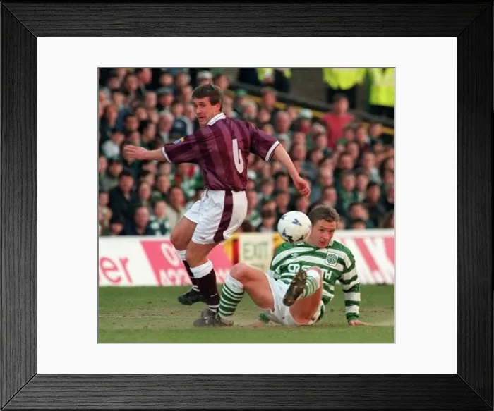 : Gary Mackay tackled by Peter Grant Celtic against Hearts Scottish premier league match : Gary Mackay tackled by Peter Grant Celtic against Hearts Scottish premier league match