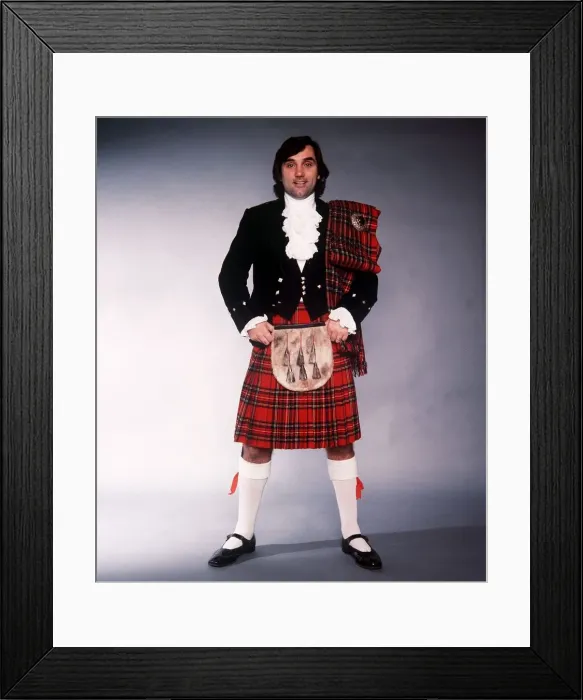 Framed Print : George Best football player dressed in traditional Scottish dress 1980
