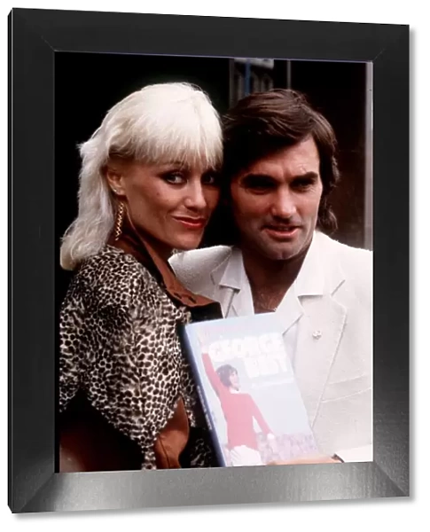 George Best and Angela Best with his book March 1982