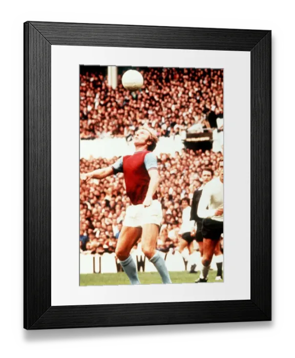 Framed Print : West Ham Uniteds Bobby Moore brings the ball under control 1972 Framed Print : West Ham Uniteds Bobby Moore brings the ball under control 1972