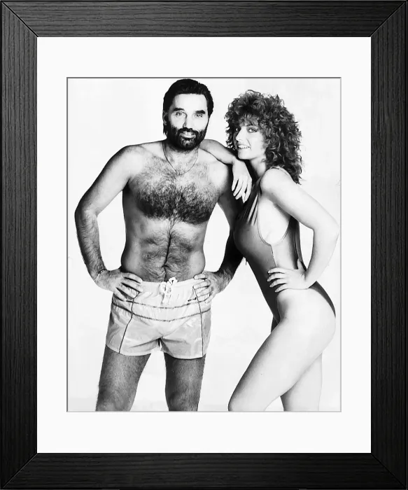 Framed Print : George Best footballer posing with woman model 1986 Framed Print : George Best footballer posing with woman model 1986