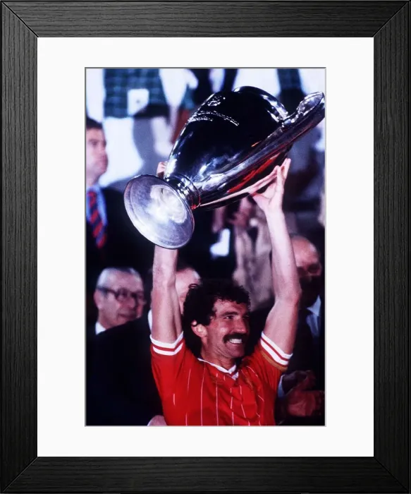 Framed Print : Liverpool captain Graeme Souness holds aloft the European Cup trophy after their victory Framed Print : Liverpool captain Graeme Souness holds aloft the European Cup trophy after their victory